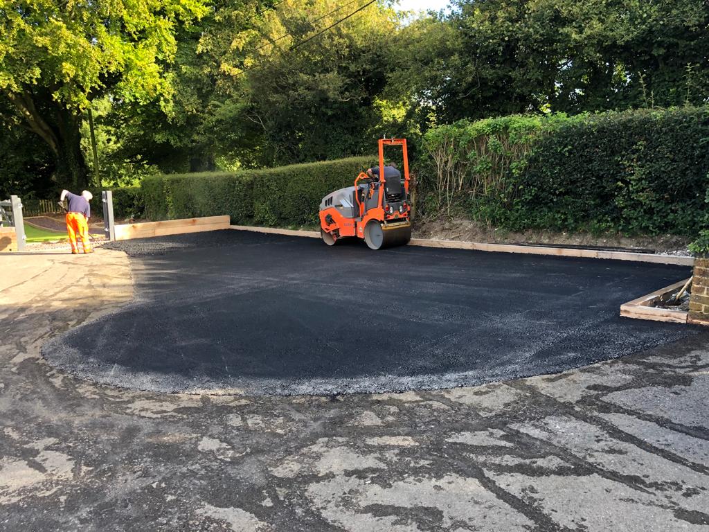 This is a photo of a bitumen driveway which is in the process of being installed by Gawler Road Tech SA